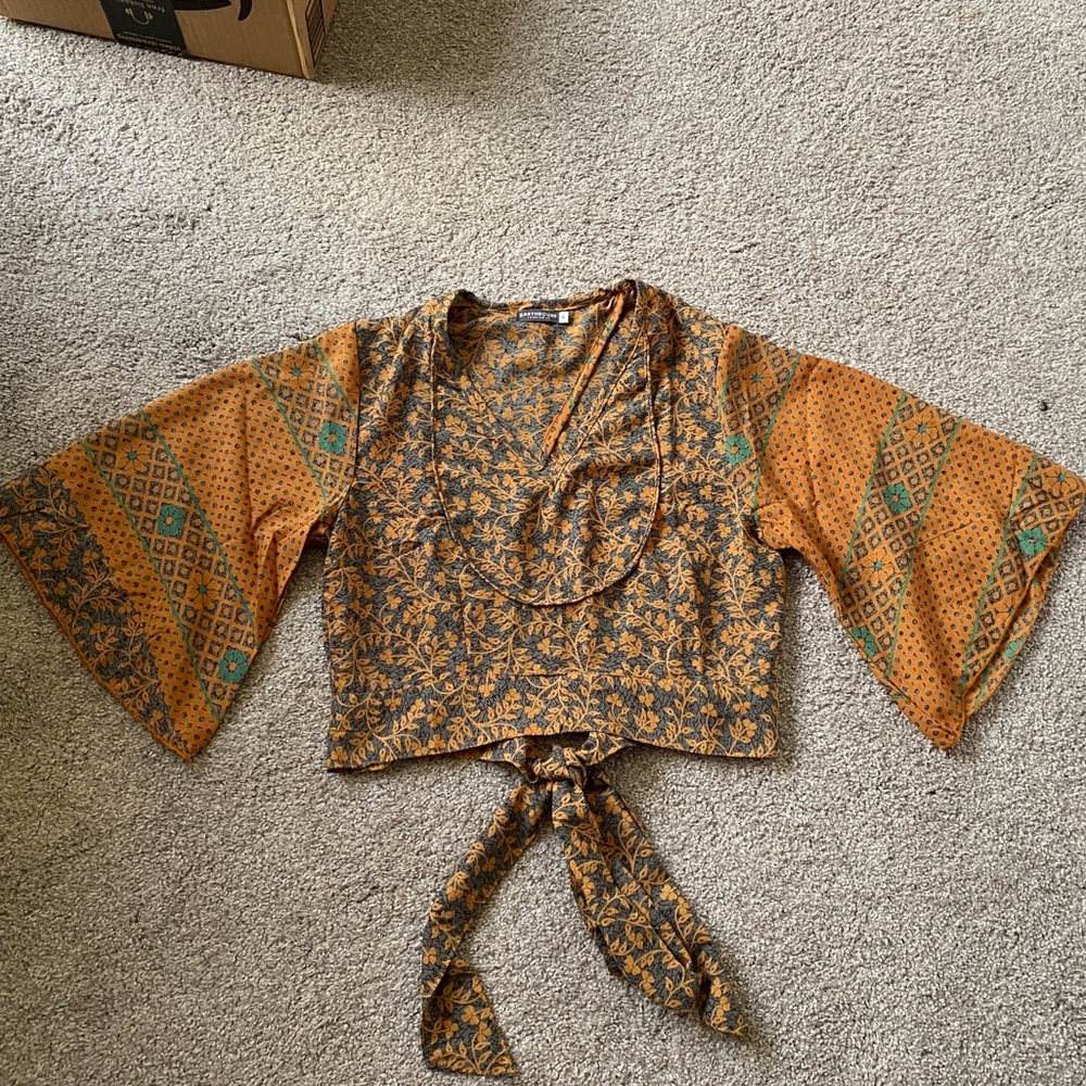 Earthbound bell sleeve top with tie in the back